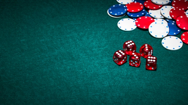 bright-red-dices-casino-chips-green-poker-background_23-2147881084